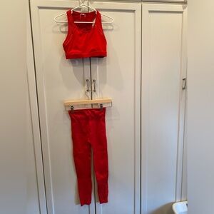 Red fabletics sports bra and leggings set